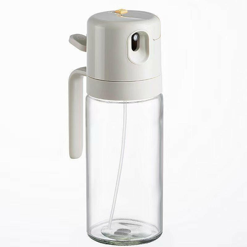 2 in 1 oil sprayer with a clear container and easy-grip handle for efficient kitchen storage and use