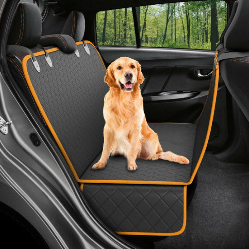 Dog car seat cover in black with orange trim, featuring a golden retriever sitting comfortably in the back seat