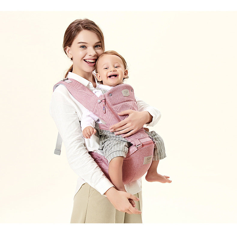Mystore Ergonomic Baby Carrier in Pink, designed for comfort with a happy baby securely attached