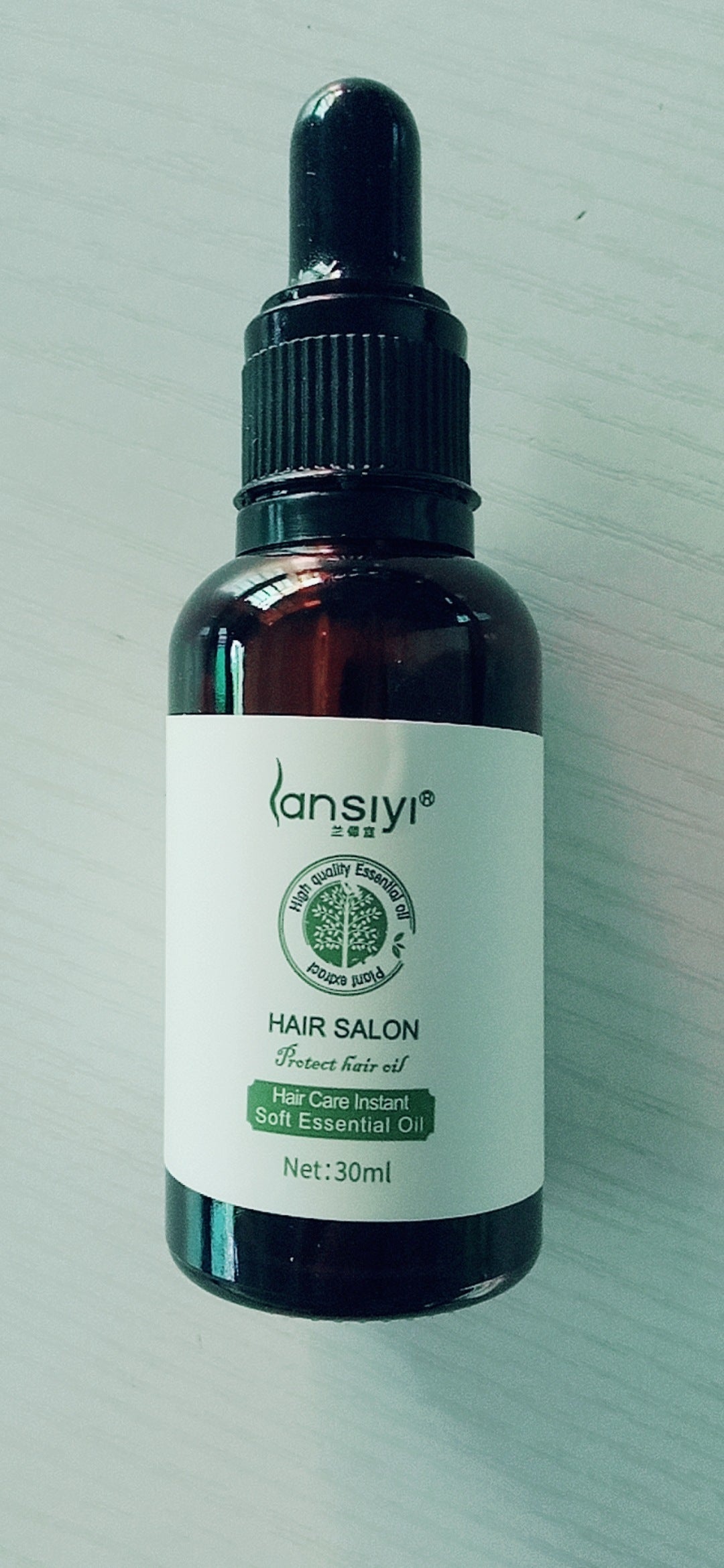Mystore Hair Salon Essential Oil for Hair Care in a 30ml bottle for nourishing and moisturizing hair