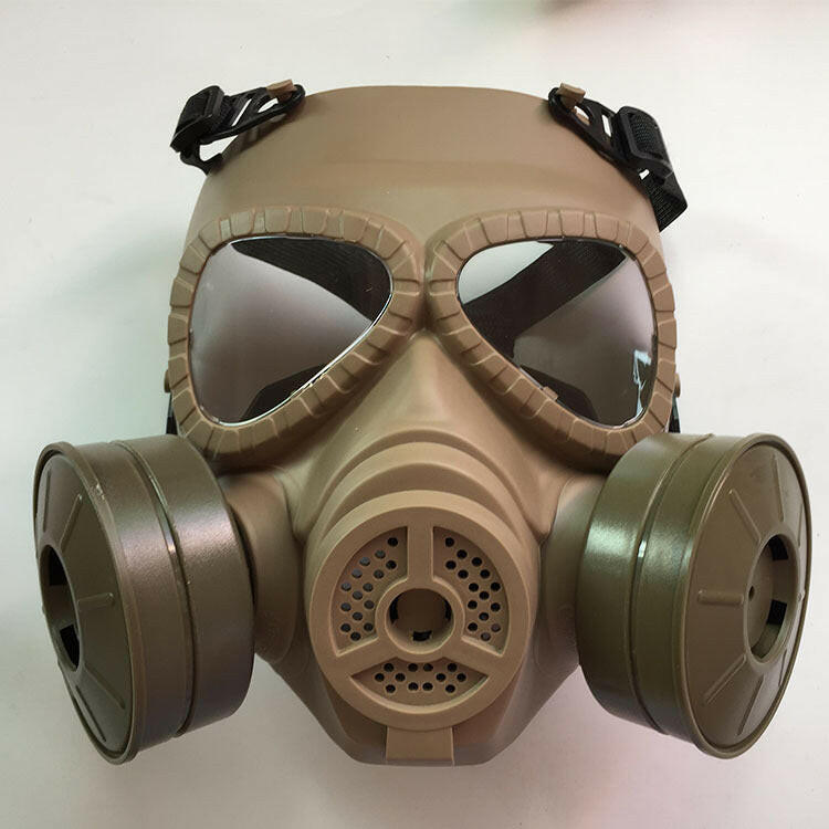 Industrial safety gas mask in tan color with dual filters and clear lenses for optimal protection