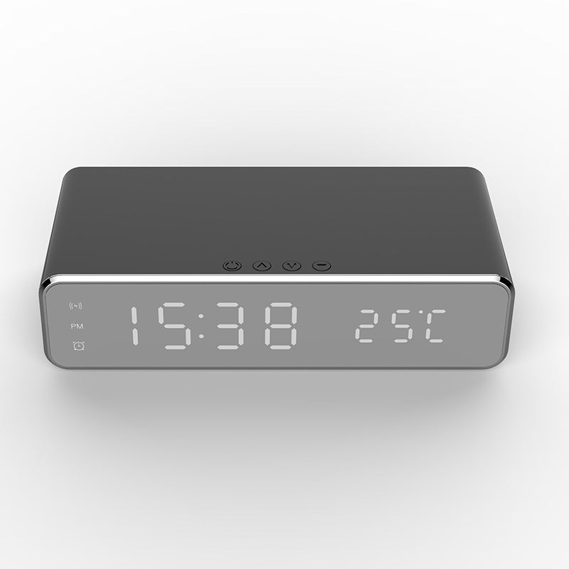 Mystore LED alarm clock with wireless charger displaying time and temperature in a sleek design