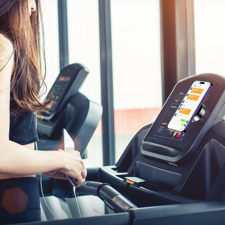 Sophisticated magnetic phone holder car mount attached to treadmill for easy device access during workouts