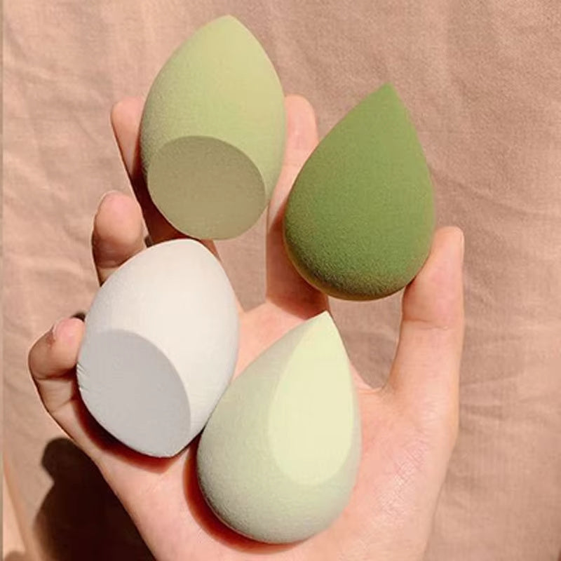 Mystore makeup sponge set featuring four teardrop-shaped sponges in green and white shades