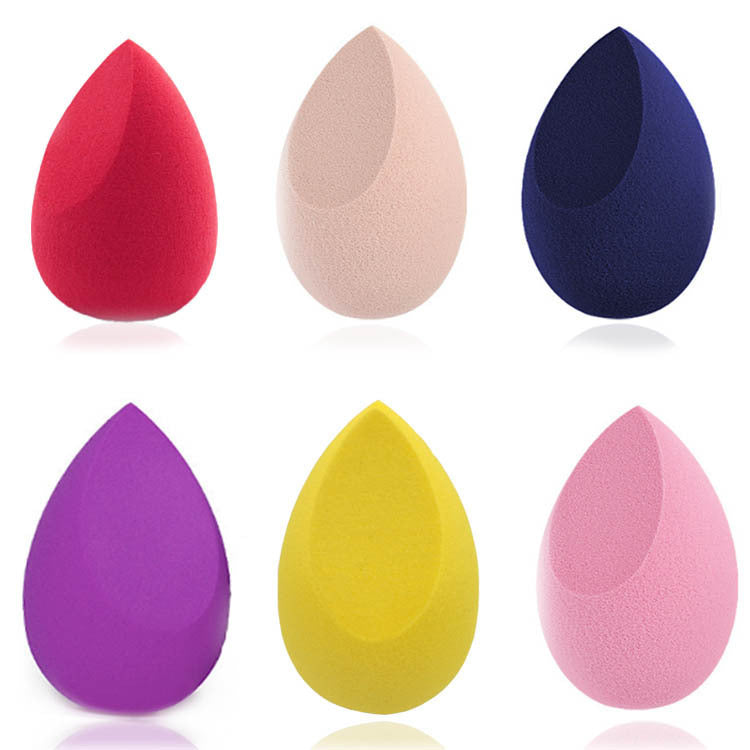 Colorful makeup sponge set featuring six sponges in red, pink, purple, yellow, nude, and blue shades