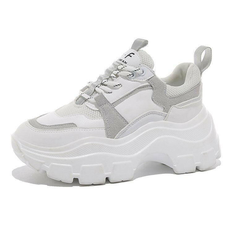 Trendy platform daddy shoes in white and grey with a chunky sole for a stylish look