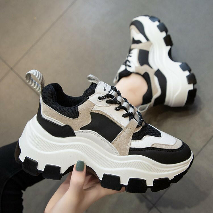 Trendy platform daddy shoes in black and beige with thick rubber soles for stylish comfort