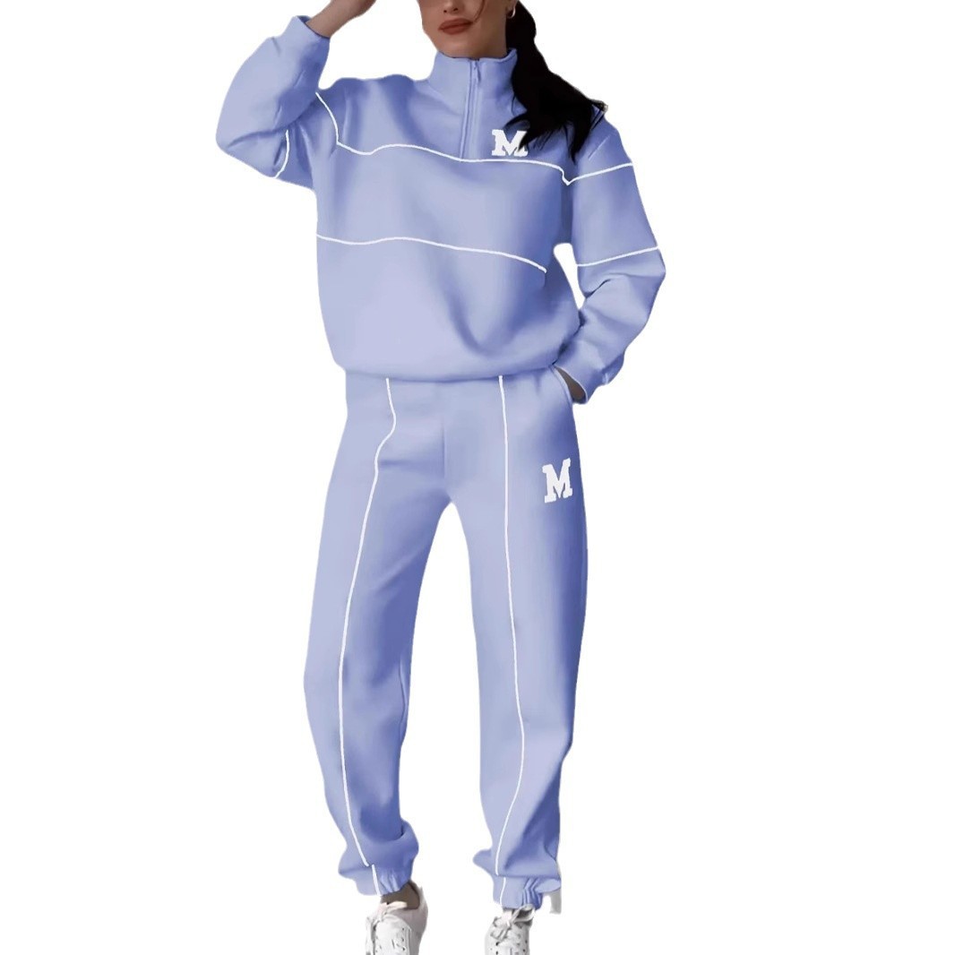 Light purple women's lounge sweatsuit set with white piping and letter M logo, hoodless two-piece outfit