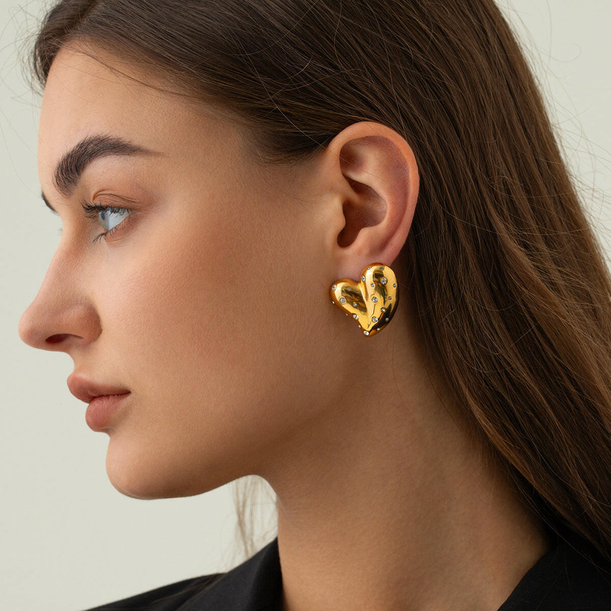 Mystore 18K gold heart earrings featured on a model for a stylish look