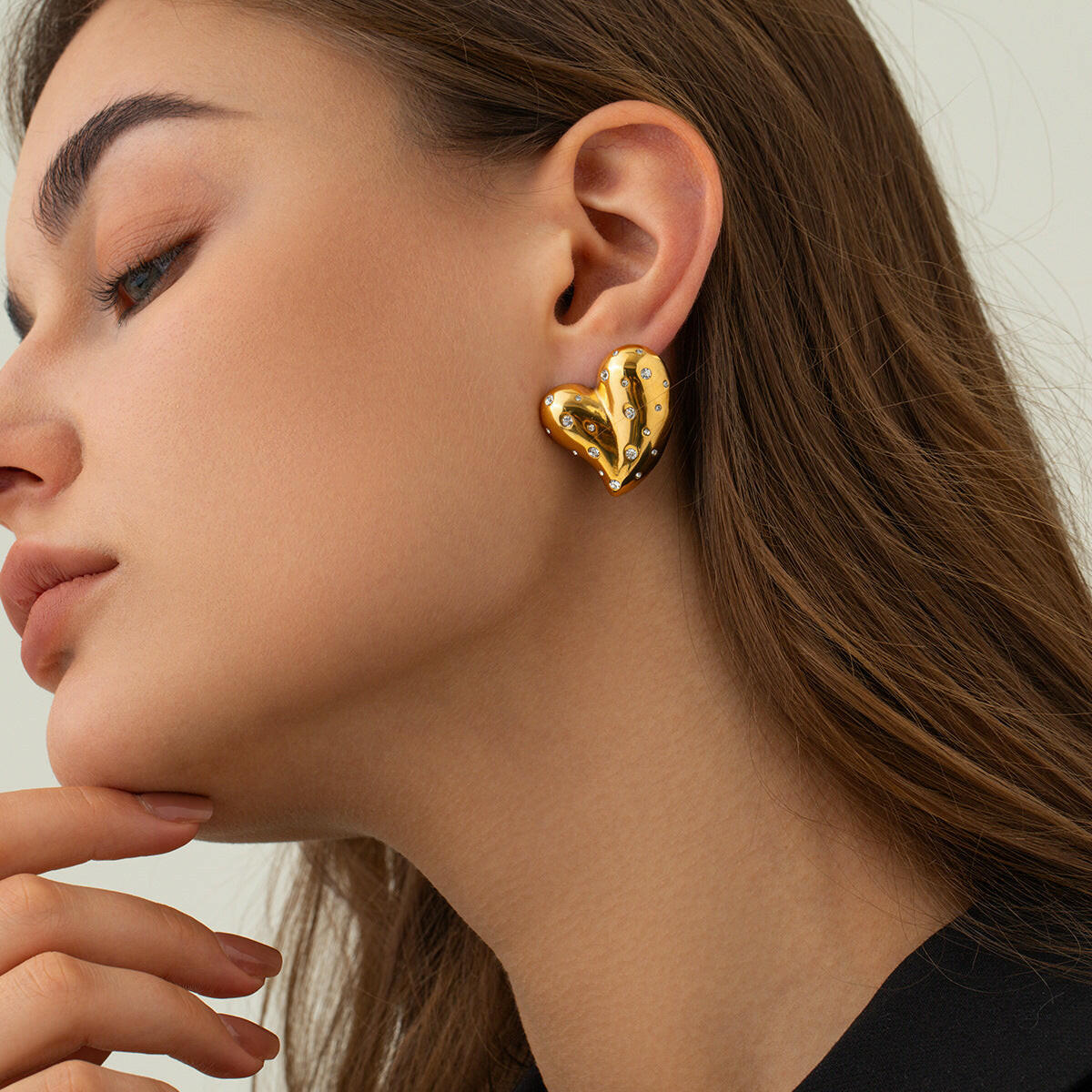 Elegant 18K gold heart earrings designed for stylish accessorizing and special occasions