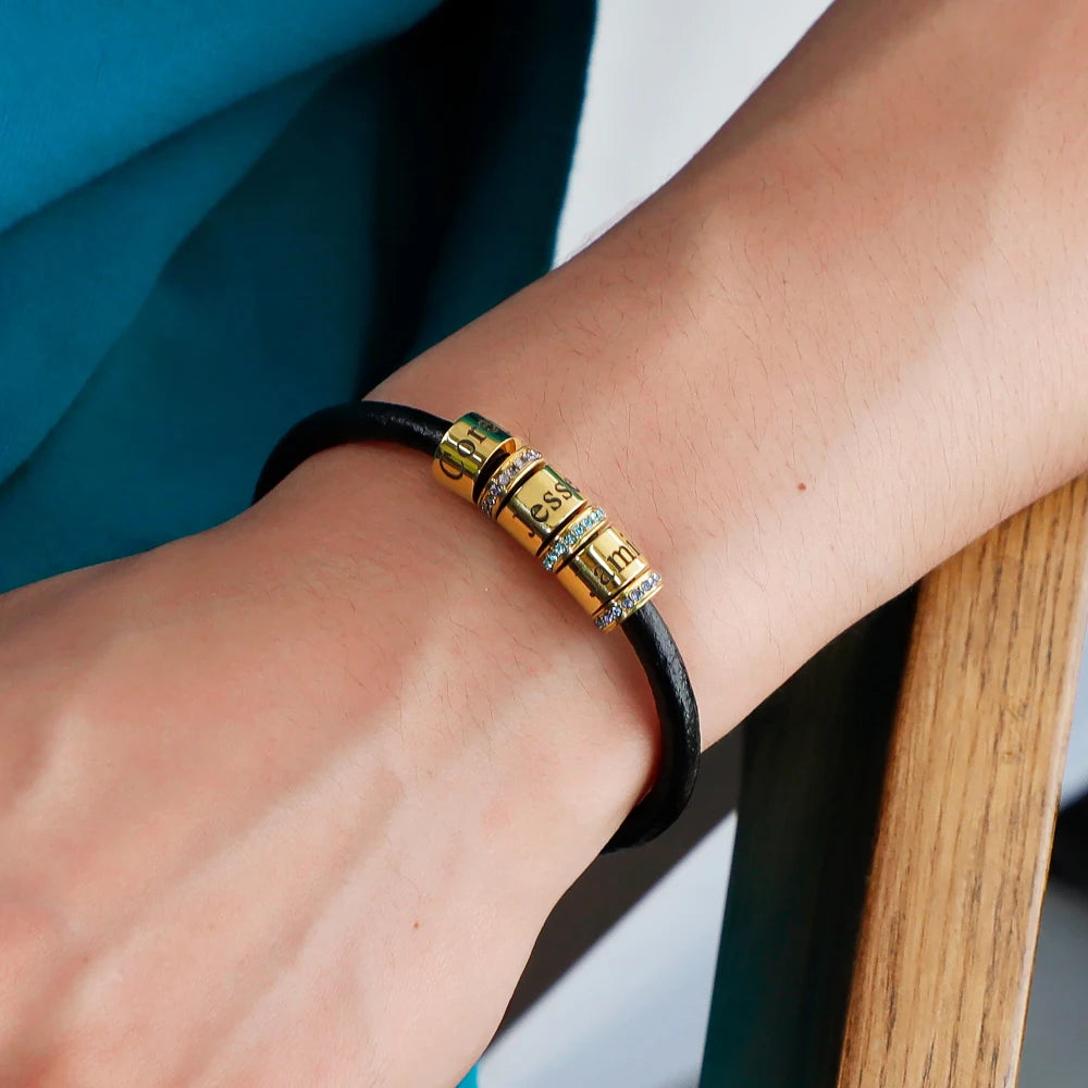 Stylish personalized name bracelet in black leather with gold letters for a custom touch